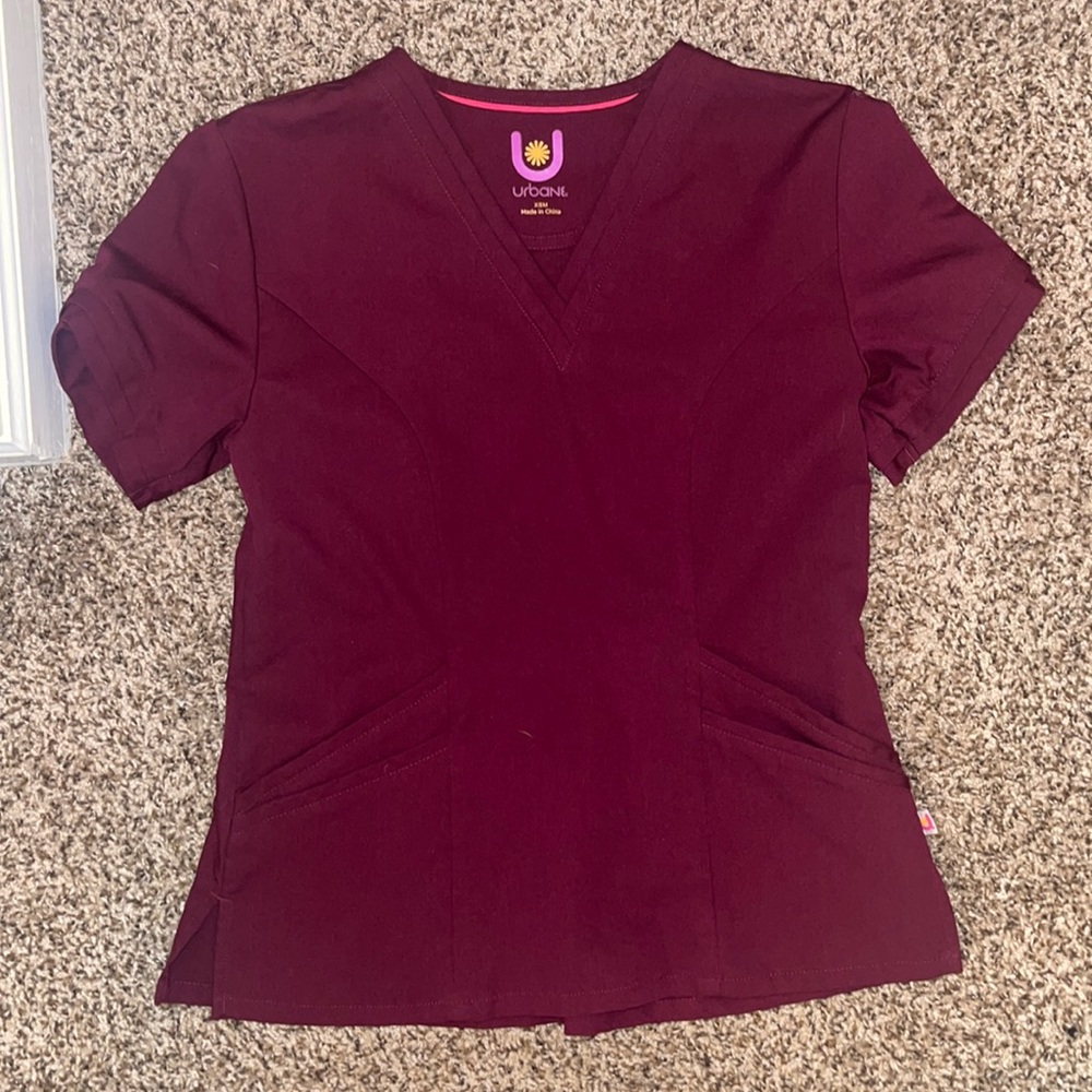 Urbane brand scrubs, never worn. Tags removed to wash then never worn. XS